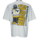 1990s vintage NHL Pittsburgh Penguins front and back printed T-Shirt. Grey in color with spell-out and cartoon penguin Iceburgh on front and back, fits X-Large in size and is in excellent condition.