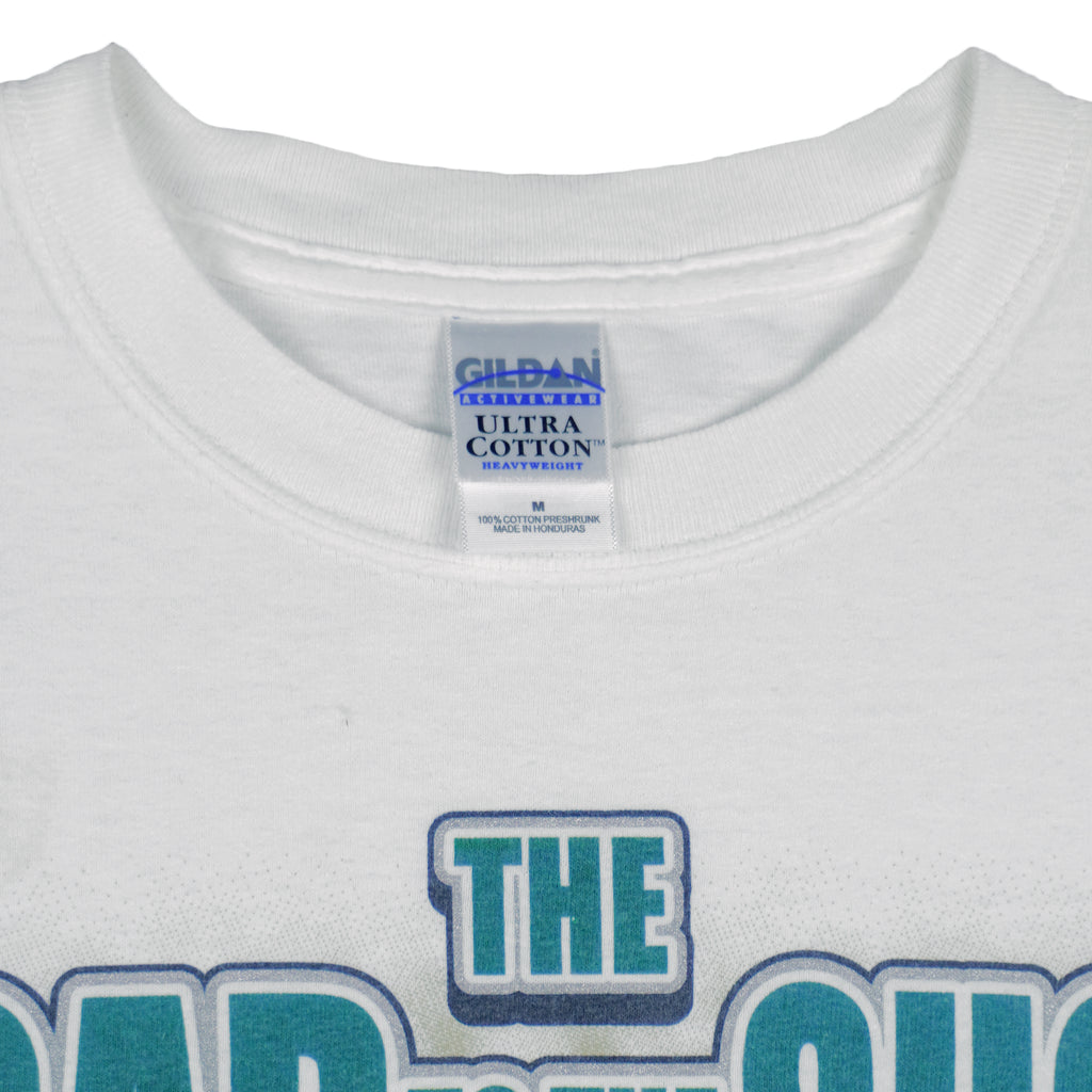 2003 vintage MLB Seattle Mariners "Road to the Show" spell-out T-Shirt by Gildan. White in color with farm team logos (Everett Aquasox, Wisconsin Timber Rattlers, Inland Empire 66ers of San Bernardino, San Antonio Missions, Tacoma Rainiers), Medium in size and is in excellent condition.