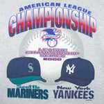 2000 vintage MLB Mariners Vs Yankees American League Championship T-Shirt by All Sport. Grey in color with big spell-out and baseball caps printed graphic, X-Large in size and is in excellent condition.