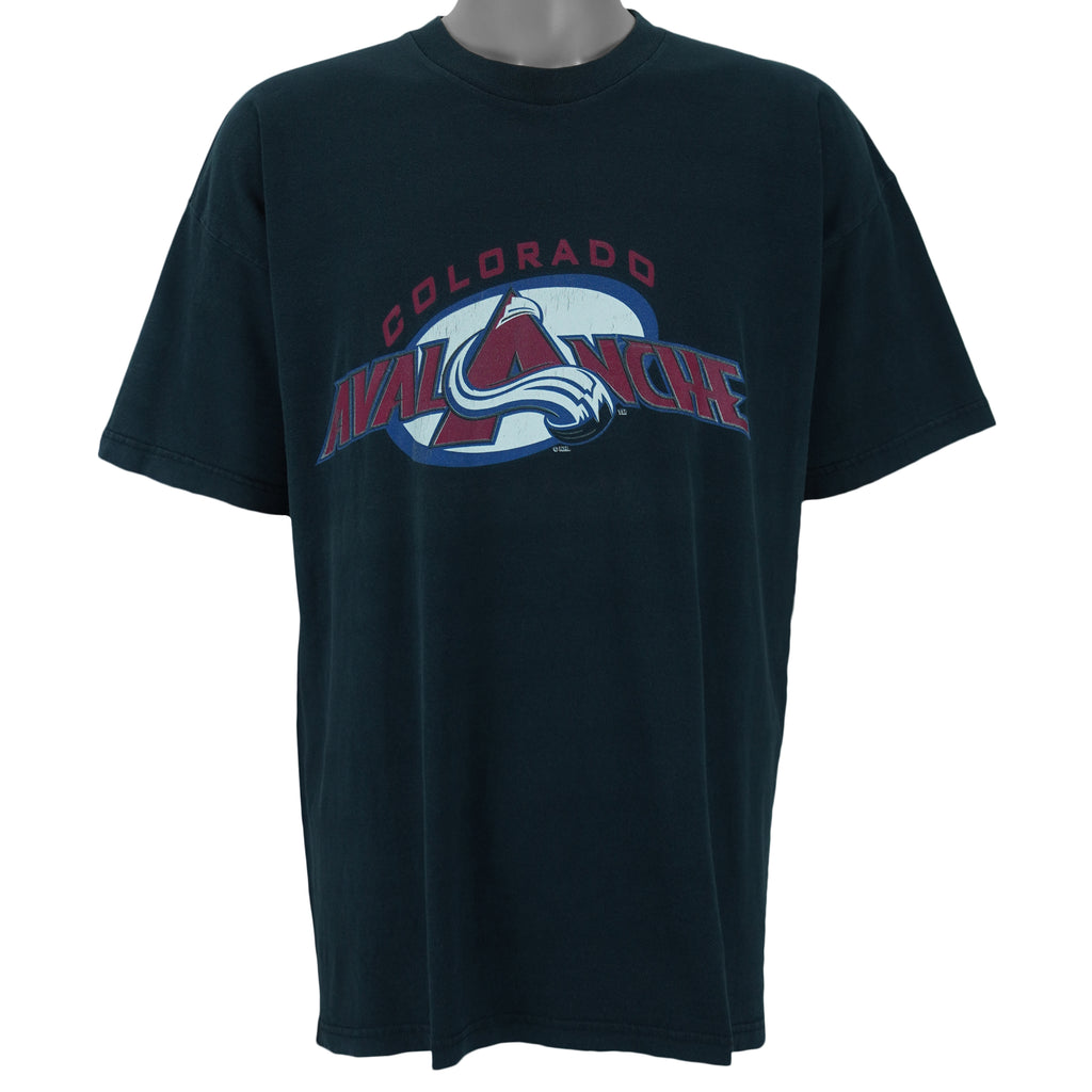 1990s vintage NHL Colorado Avalanche T-Shirt by League Leader. Black​ in color with big logo, X-Large in size and is in excellent condition.