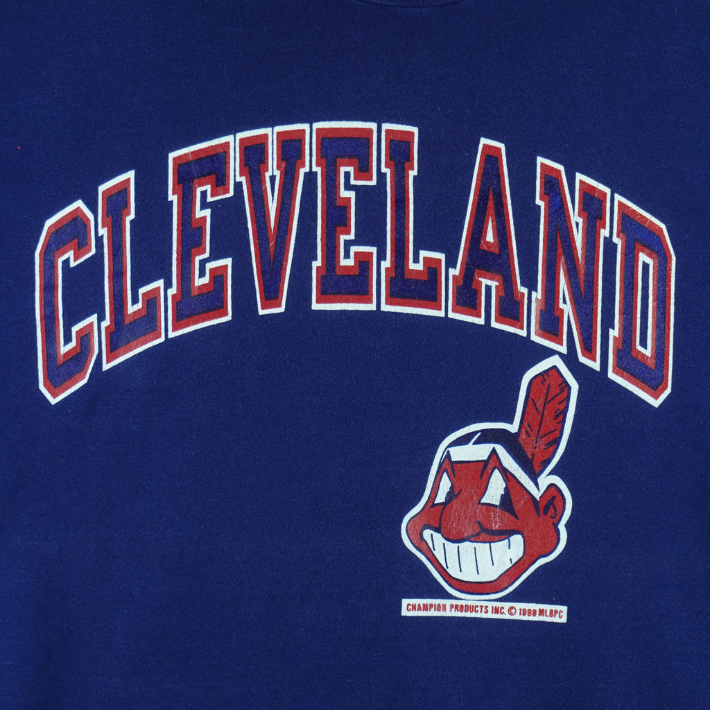 1988 vintage MLB Cleveland Indians spell-out printed T-Shirt by Champion Products. Blue in color with logo on front. Fits Large in size and is in excellent condition.