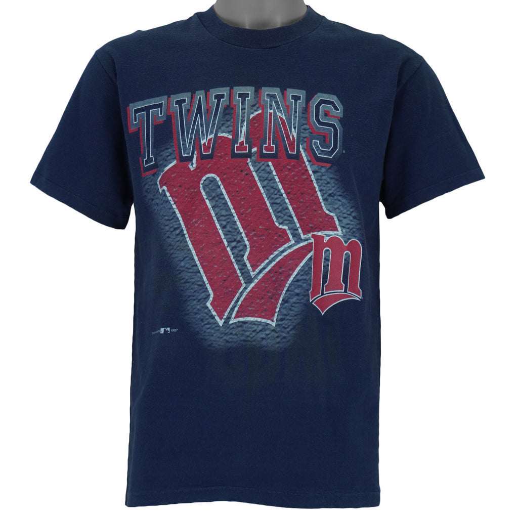 1997 vintage MLB Minnesota Twins spell-out T-Shirt by Champknit for Team Hanes. Blue in color, Medium in size and is in excellent condition.