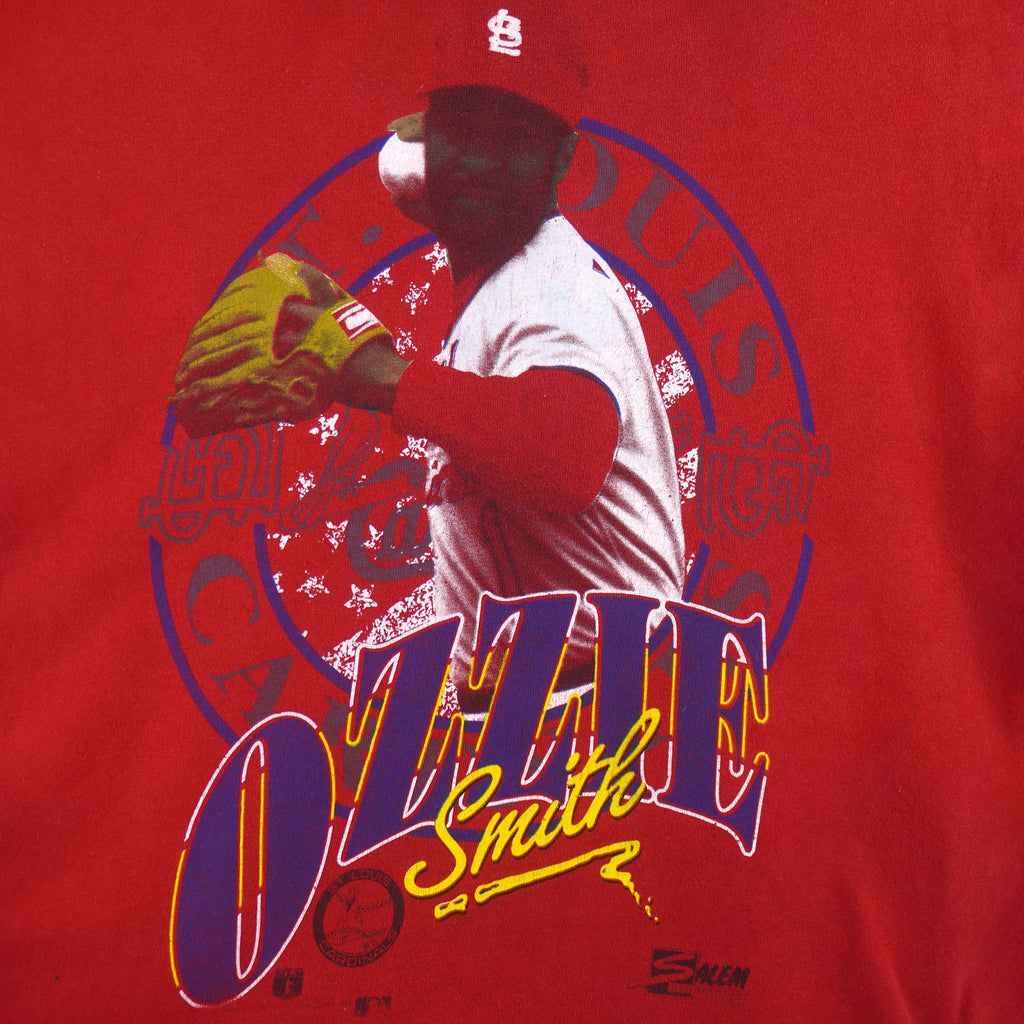 1990 vintage MLB St. Louis Cardinals Ozzie Smith spell-out T-Shirt by Salem Sportswear. Red in color with player image on front, Medium in size and is in excellent condition.