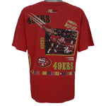 1990s vintage NFL San Francisco 49ers Aerial Assault all over print T-Shirt by Salem Sportswear. Red in color with spell-out and big logos, Salem patch on lower left front, is X-Large in size and is in excellent condition.