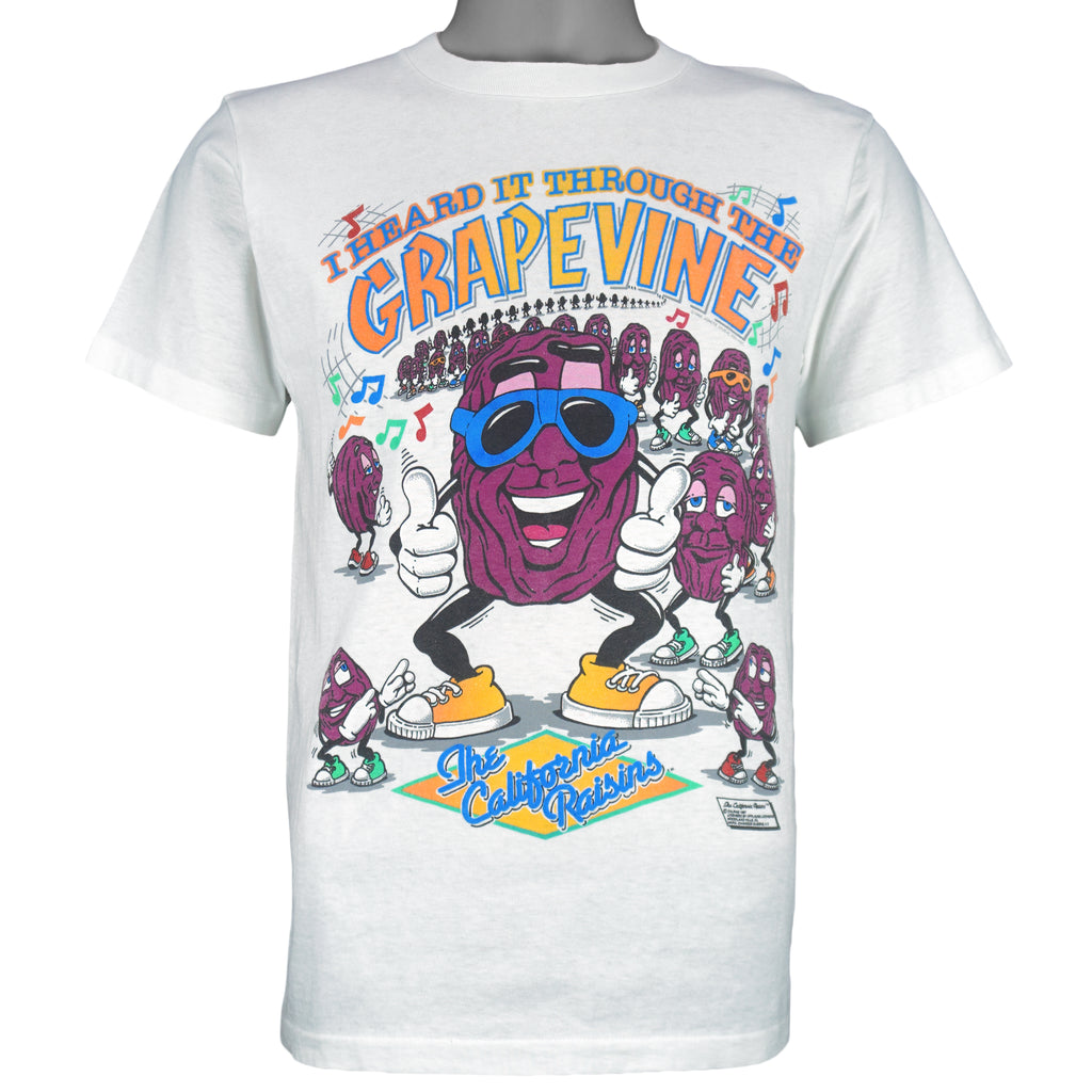 1987 vintage The California Raisins "I Heard it Through the Grapevine" T-Shirt by Anvil. White in color with dancing raisins and song lyric on front, fits small in size and is in excellent condition.