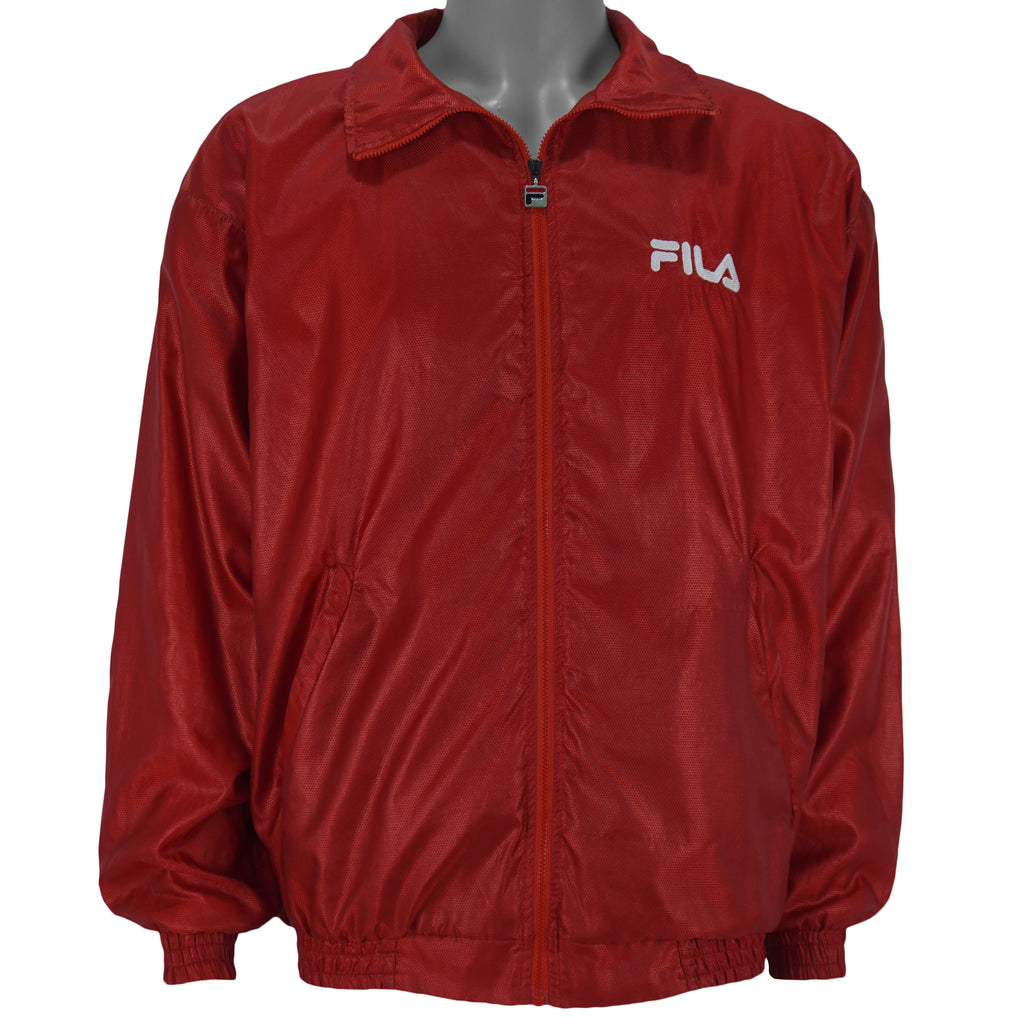 1990s vintage FILA lightweight zip-up jacket. Red in color, with embroidered logos on front and back, Medium in size and in very good condition.