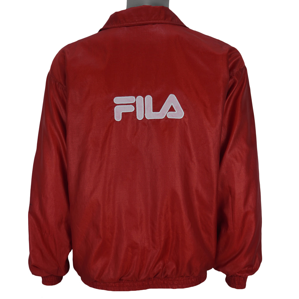 1990s vintage FILA lightweight zip-up jacket. Red in color, with embroidered logos on front and back, Medium in size and in very good condition.