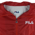 1990s vintage FILA lightweight zip-up jacket. Red in color, with embroidered logos on front and back, Medium in size and in very good condition.