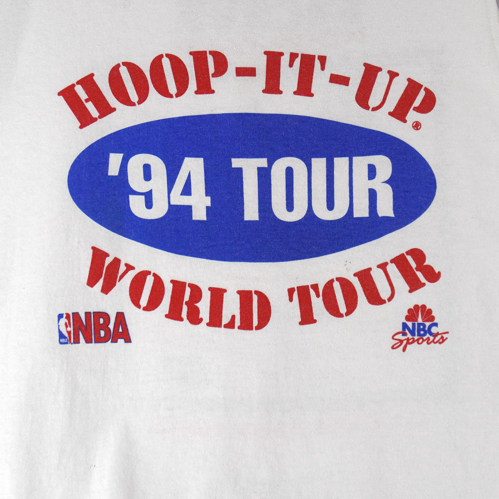 1994 vintage Cleveland Cavaliers Hoop-It-Up NBA World Tour tank top by Champion. White in color with large spell-out on front and sponsors graphic on back, tagged sized X-Large and is in excellent condition.