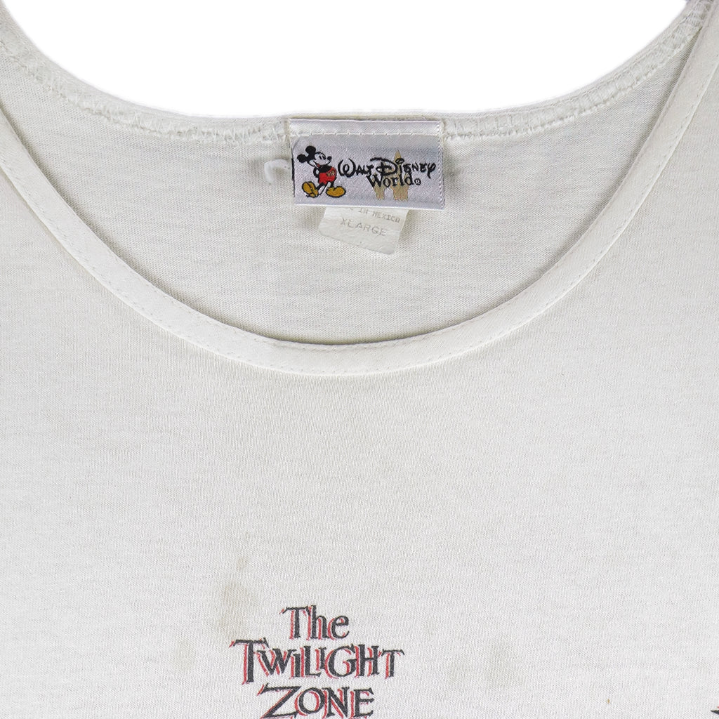 Vintage Walt Disney World "I Survived!" The Twilight Zone Tower of Terror sleeveless shirt. White in color with big printed graphic of The Hollywood Tower Hotel, tagged size X-Large, and is in good condition.