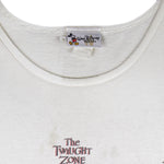 Vintage Walt Disney World "I Survived!" The Twilight Zone Tower of Terror sleeveless shirt. White in color with big printed graphic of The Hollywood Tower Hotel, tagged size X-Large, and is in good condition.