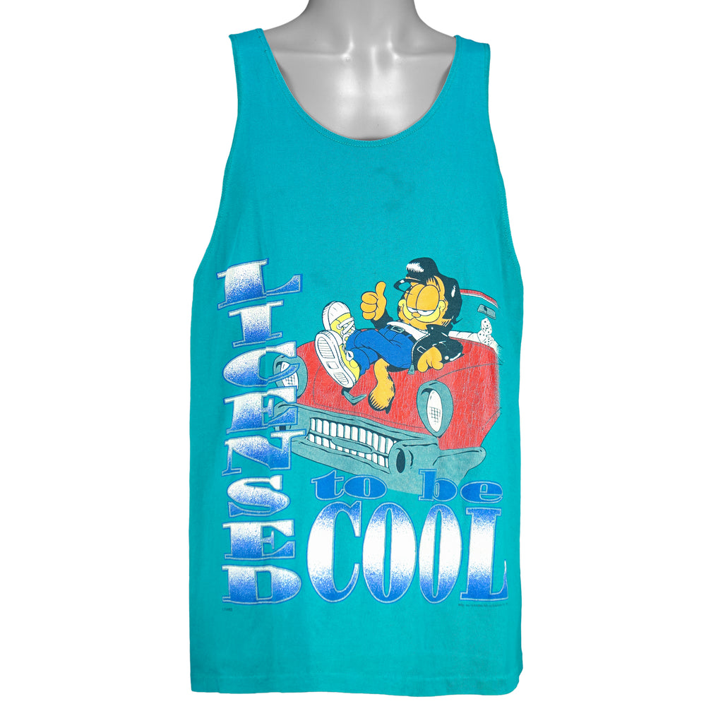 1990s vintage Garfield Licensed to Be Cool tank top. Teal in color with Garfield dressed like Elvis, tagged size Large and is in excellent condition.