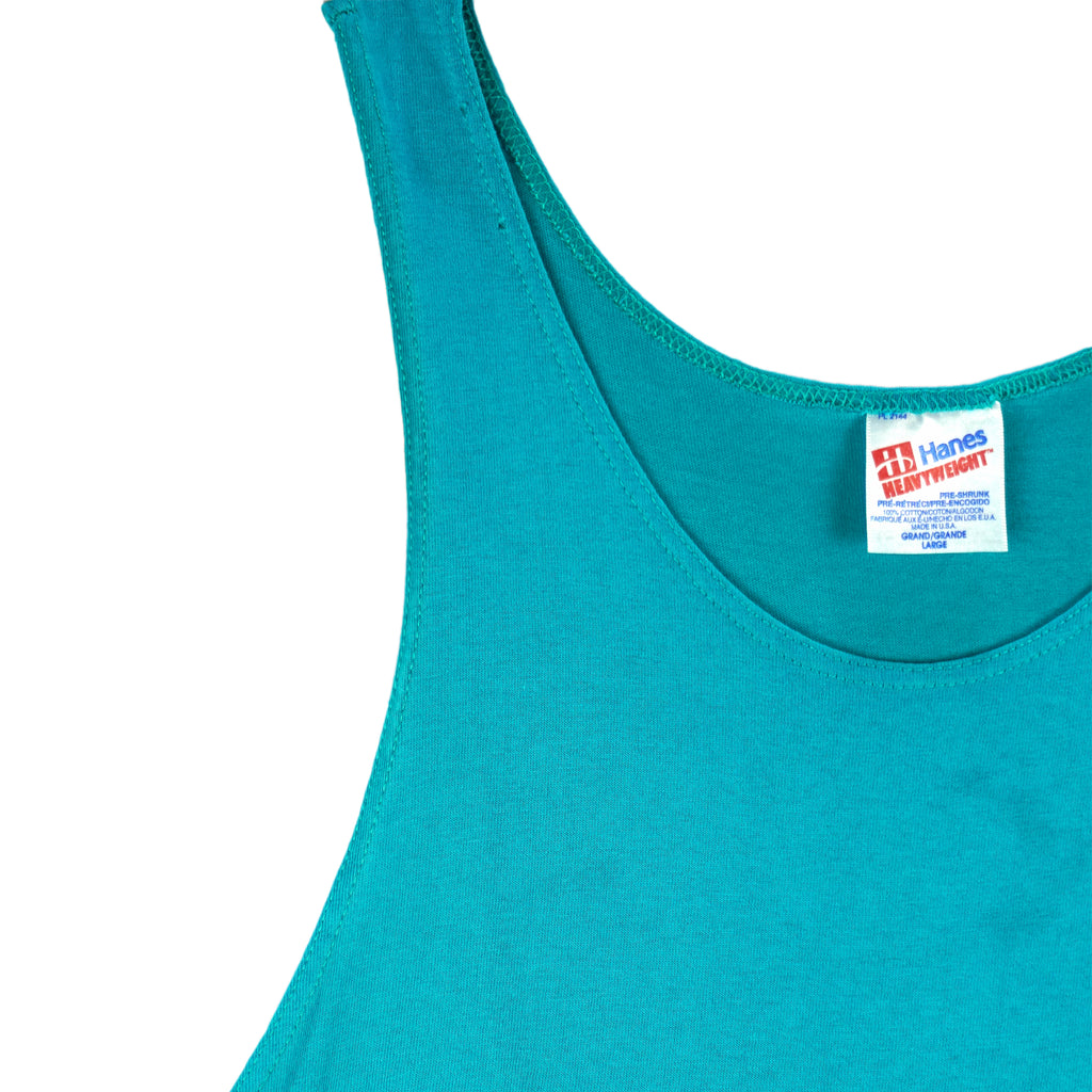 1990s vintage Garfield Licensed to Be Cool tank top. Teal in color with Garfield dressed like Elvis, tagged size Large and is in excellent condition.