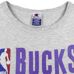 Champion - NBA Bucks Basketball Spell-Out T-Shirt 1990s XX-Large Vintage Retro Basketball