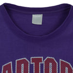 NBA (CGW) - Toronto Raptors Big Spell-Out T-Shirt 1990s X-Large Vintage Retro Basketball