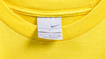 Nike - Yellow Big Spell-Out Deadestock T-Shirt 1990s Large Vintage Retro