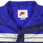 Nike - Blue & White Spell-Out Bootleg Windbreaker 1990s X-Large Vintage Retro