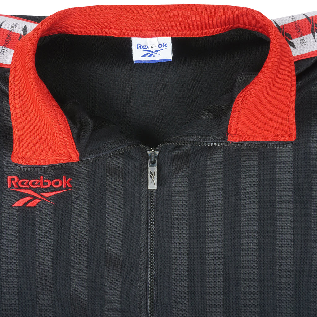 Reebok - Black & Red Spell-Out Track Jacket 1990s Large Vintage Retro