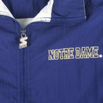 Starter - Notre Dame Fighting Irish Zip-Up Windbreaker 1990s X-Large Vintage Retro CollegeStarter - Notre Dame Fighting Irish Zip-Up Windbreaker 1990s X-Large Vintage Retro College