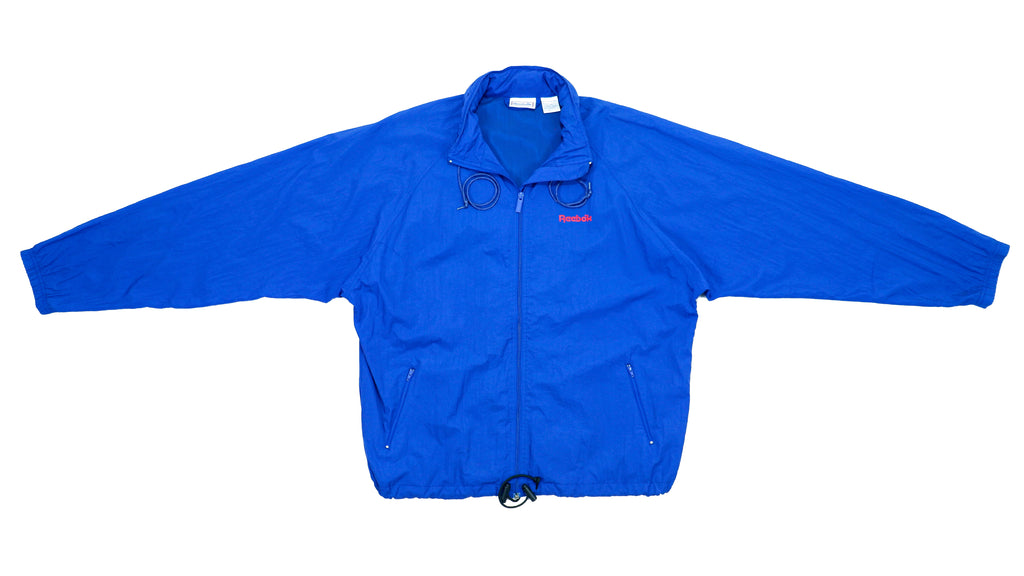 Reebok - Blue Spell-Out Windbreaker 1990s X-Large Vintage Retro